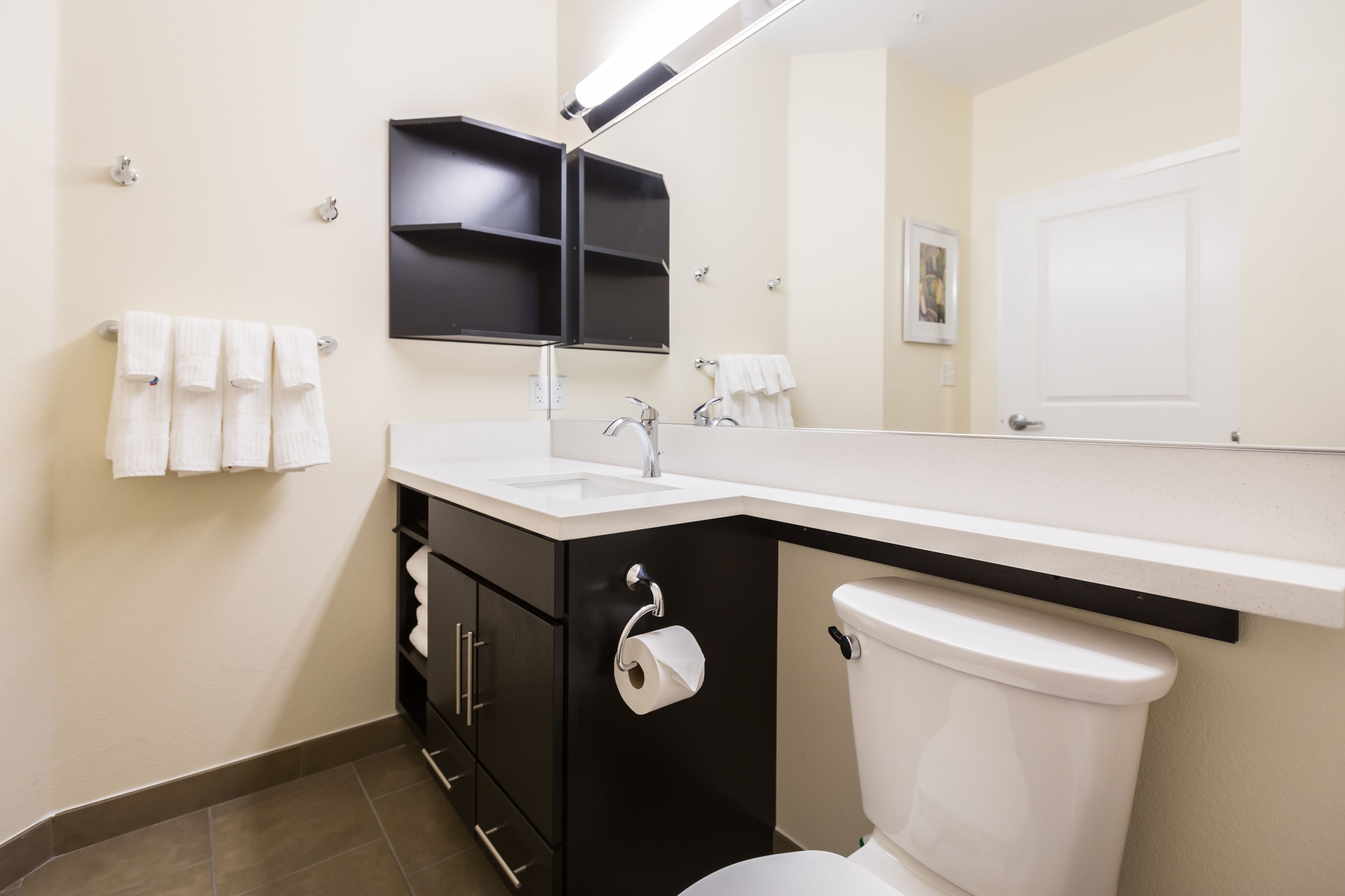 studio suite, 1 queen bed | bathroom | free toiletries, hair dryer, towels