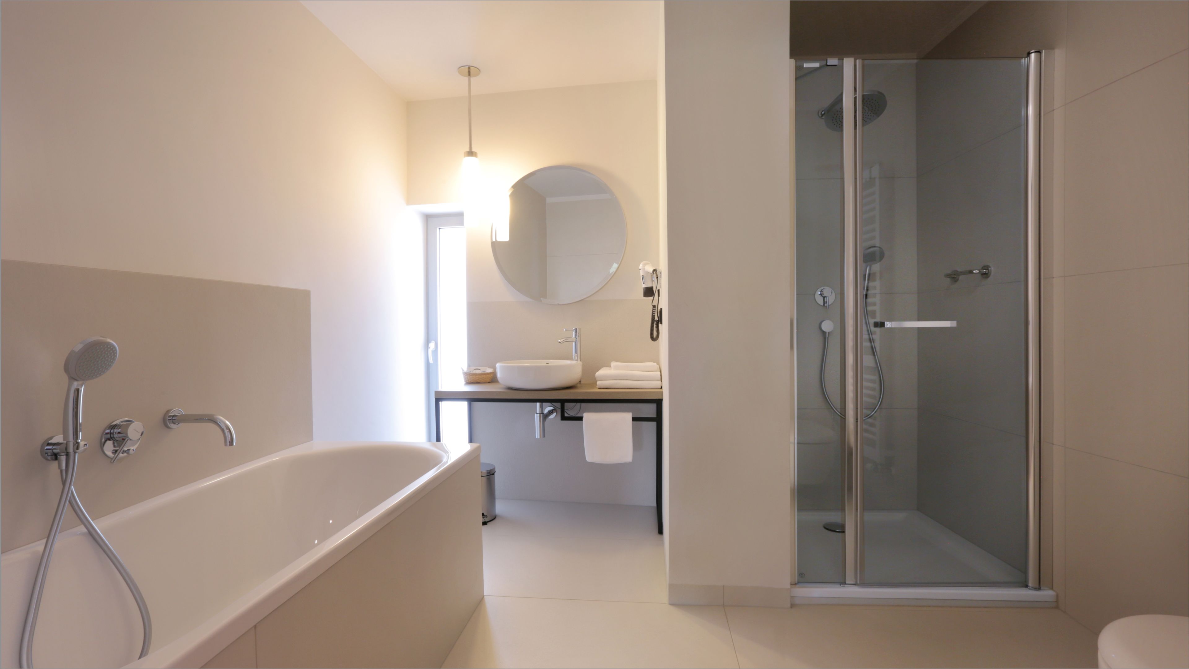 superior double room | bathroom | free toiletries, hair dryer, towels