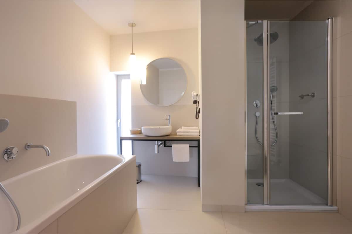 superior double room | bathroom | free toiletries, hair dryer, towels