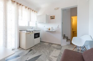 Departamento estándar, 1 habitación | Cocina privada | Refrigerador, microondas, horno y parrilla de estufa