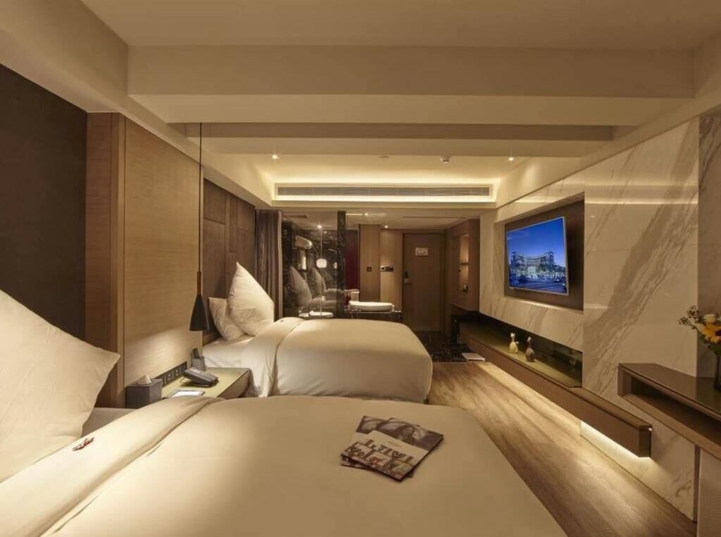 Habitación Deluxe, 2 camas individuales | Escritorio, cunas (de pago), wifi gratis y despertador