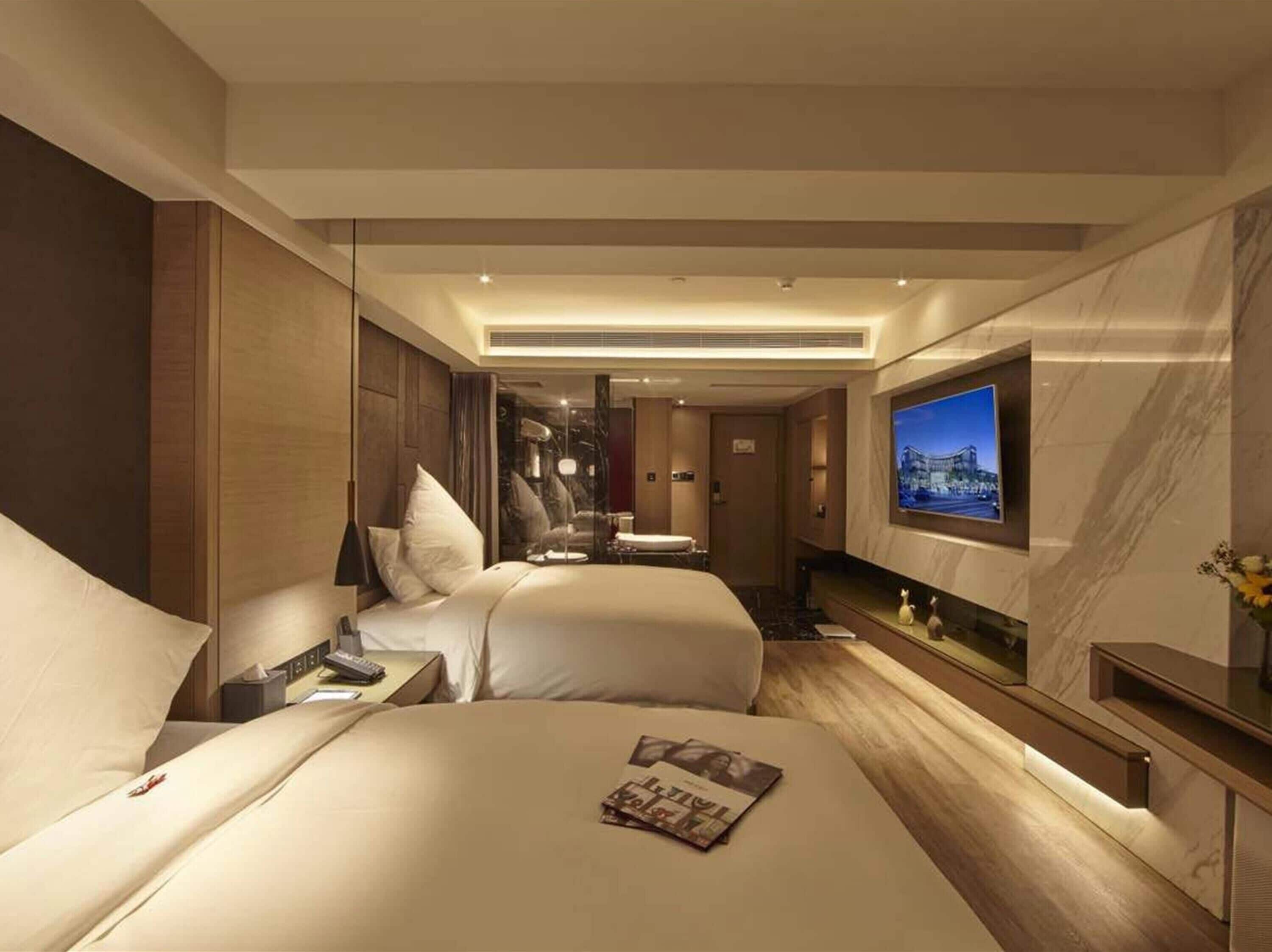 Deluxe kamer, 2 eenpersoonsbedden | Een bureau, babybedden (toeslag), gratis wifi, een wekker