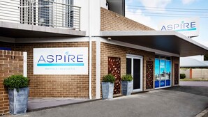 A building with a sign reading "Aspire Mayfield / Newcastle". - Aspire Mayfield (Mayfield)
