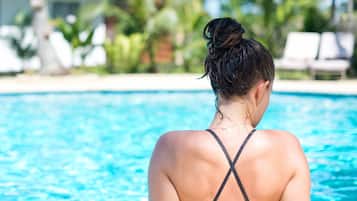 Outdoor pool, pool umbrellas, sun loungers