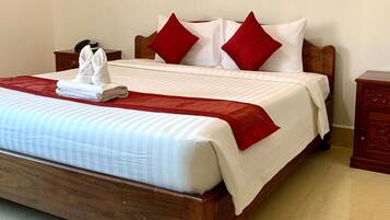 Family Double Room | Minibar, in-room safe, desk, iron/ironing board