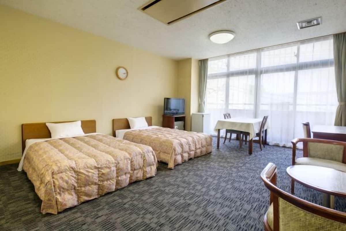 Een kluis op de kamer, verduisterende gordijnen, gratis wifi, beddengoed