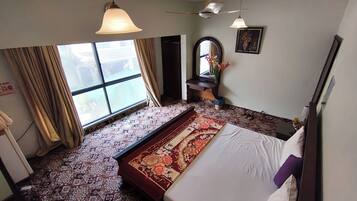 Minibar, desk, laptop workspace, blackout curtains