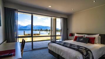 Deluxe Queen Studio | Bureau, rideaux occultants, chambres insonorisées