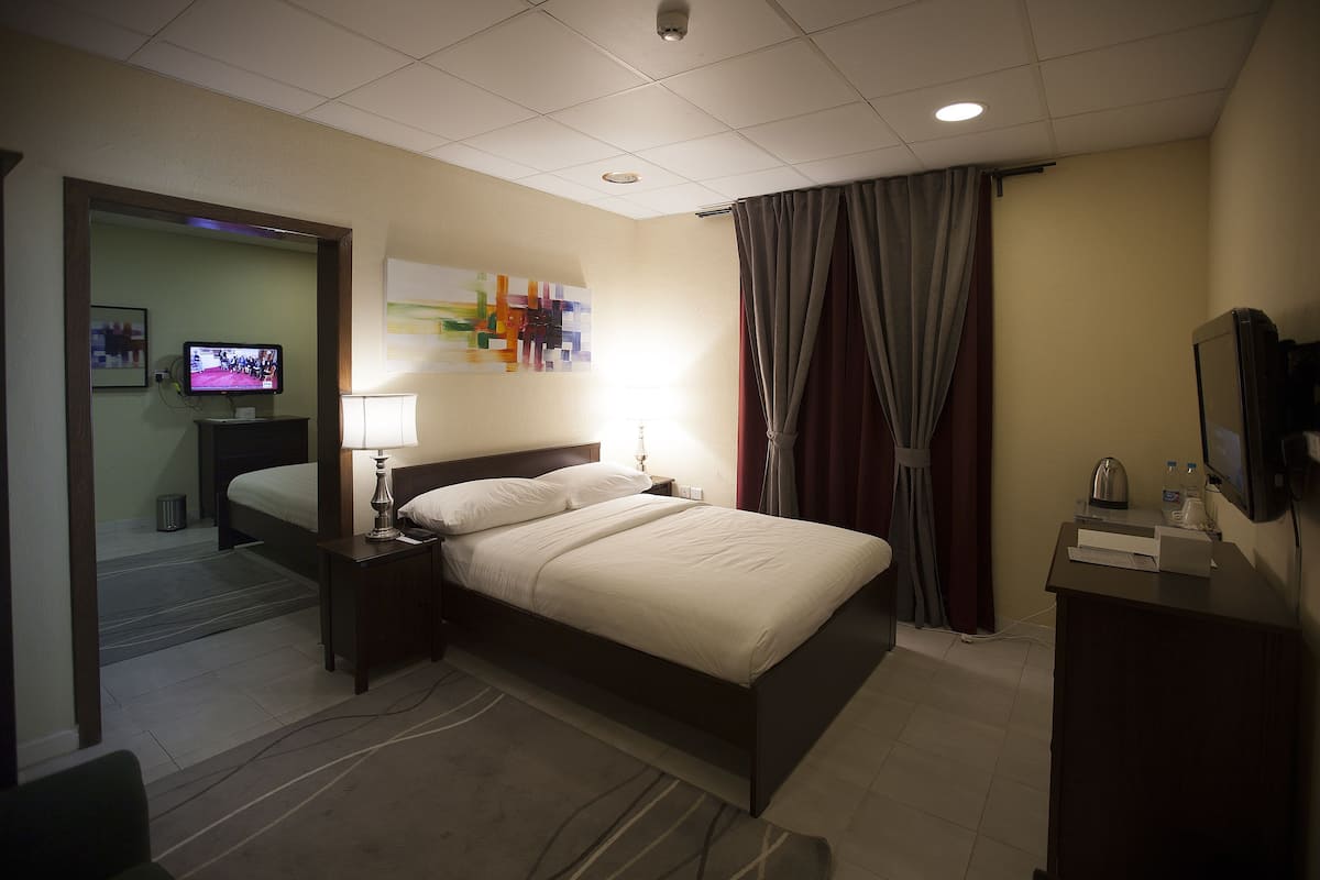 Family Room, 2 Bedrooms, Connecting Rooms | Minibar, in-room safe, desk, blackout drapes