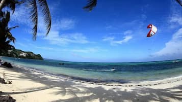 On the beach, sun loungers