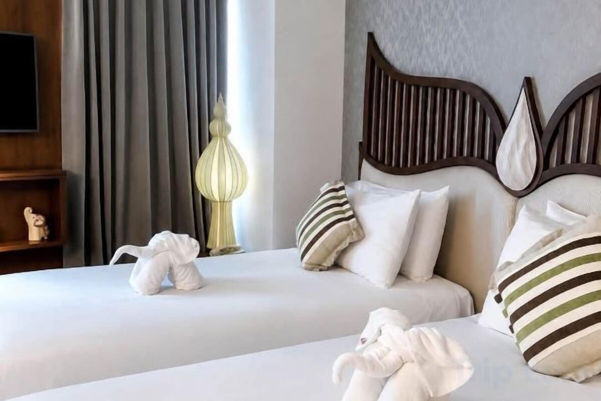 Premium bedding, memory-foam beds, minibar, in-room safe