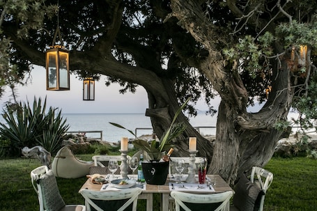 Outdoor wedding area. Athina Studios & Suites