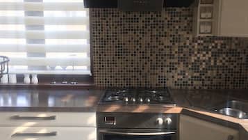 Comfort Townhome, 2 Bedrooms | Private kitchen | Full-sized fridge, oven, espresso maker, electric kettle