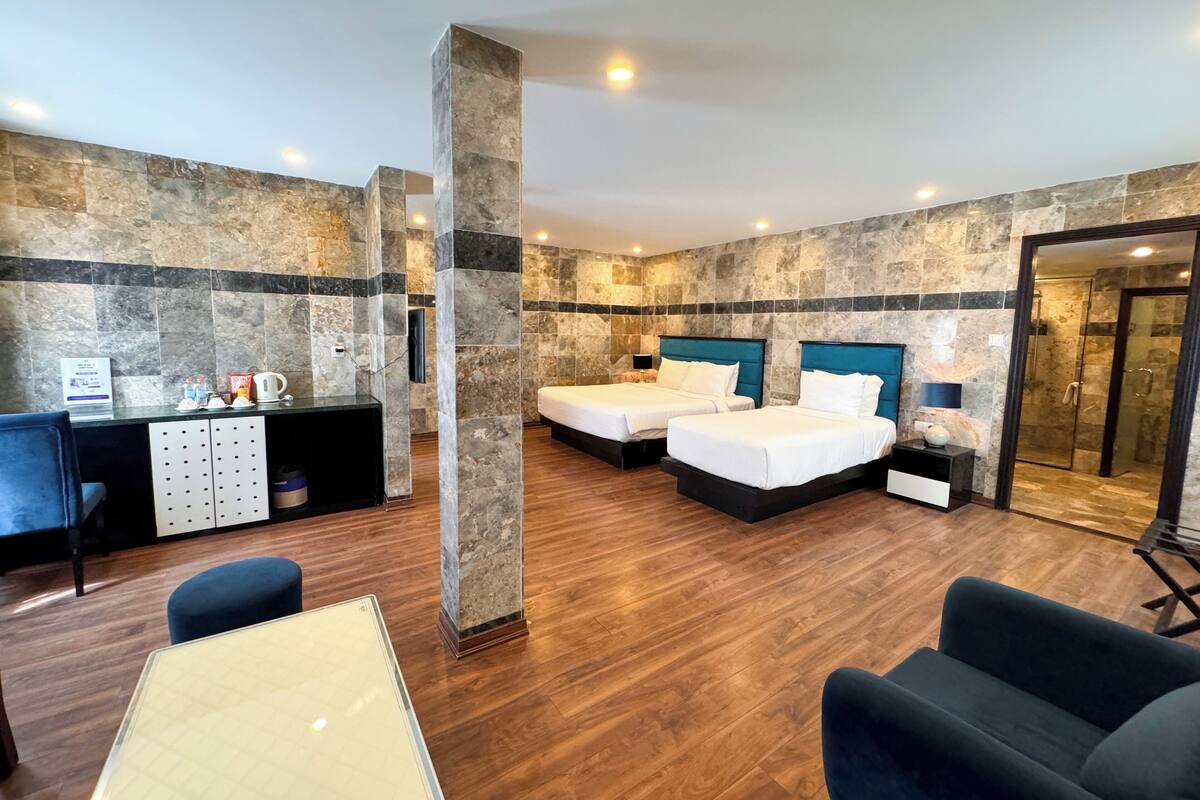 Suite Garden View | Két bảo mật tại phòng, bàn, màn/rèm cản sáng, phòng cách âm
