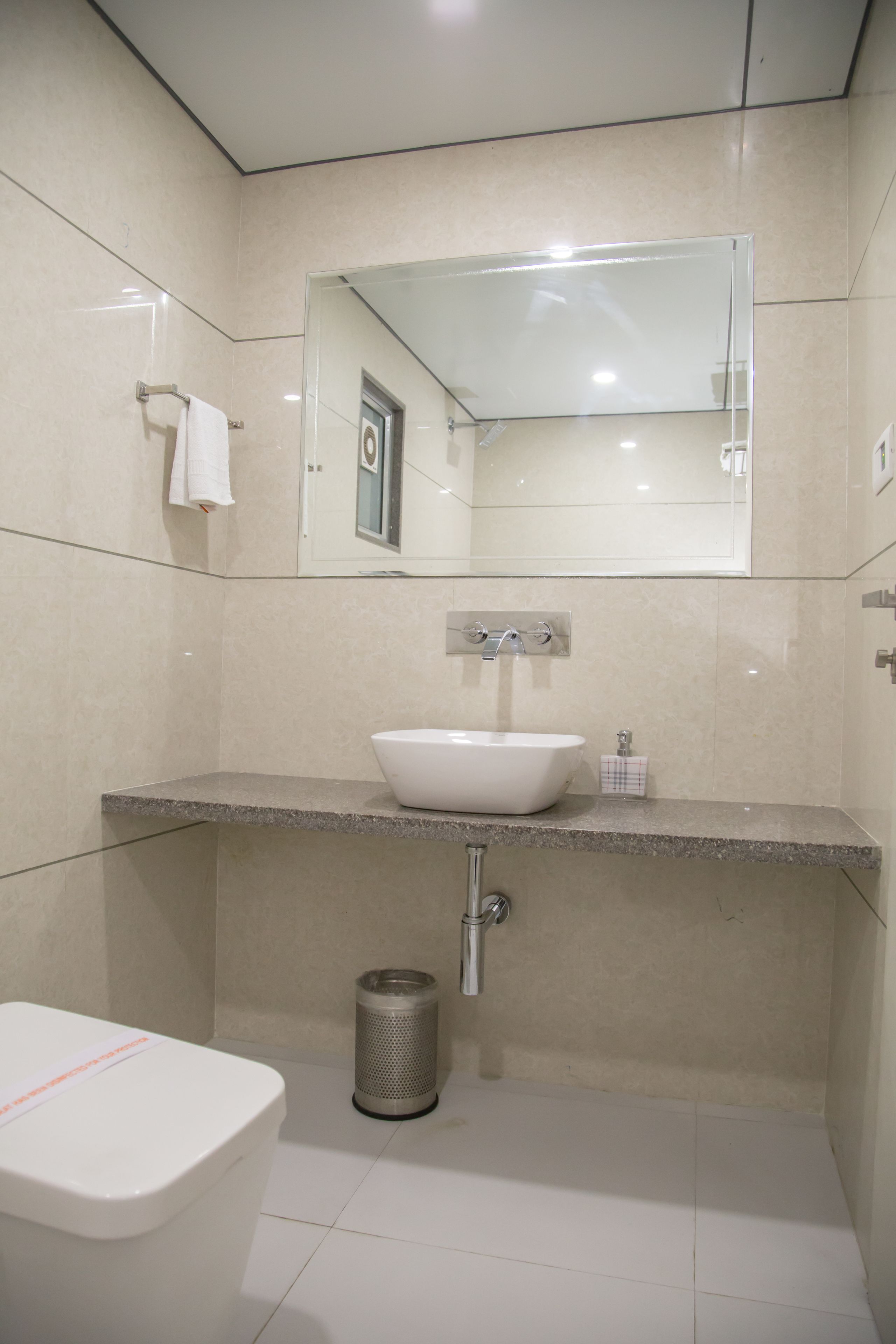 shower, free toiletries, slippers, towels