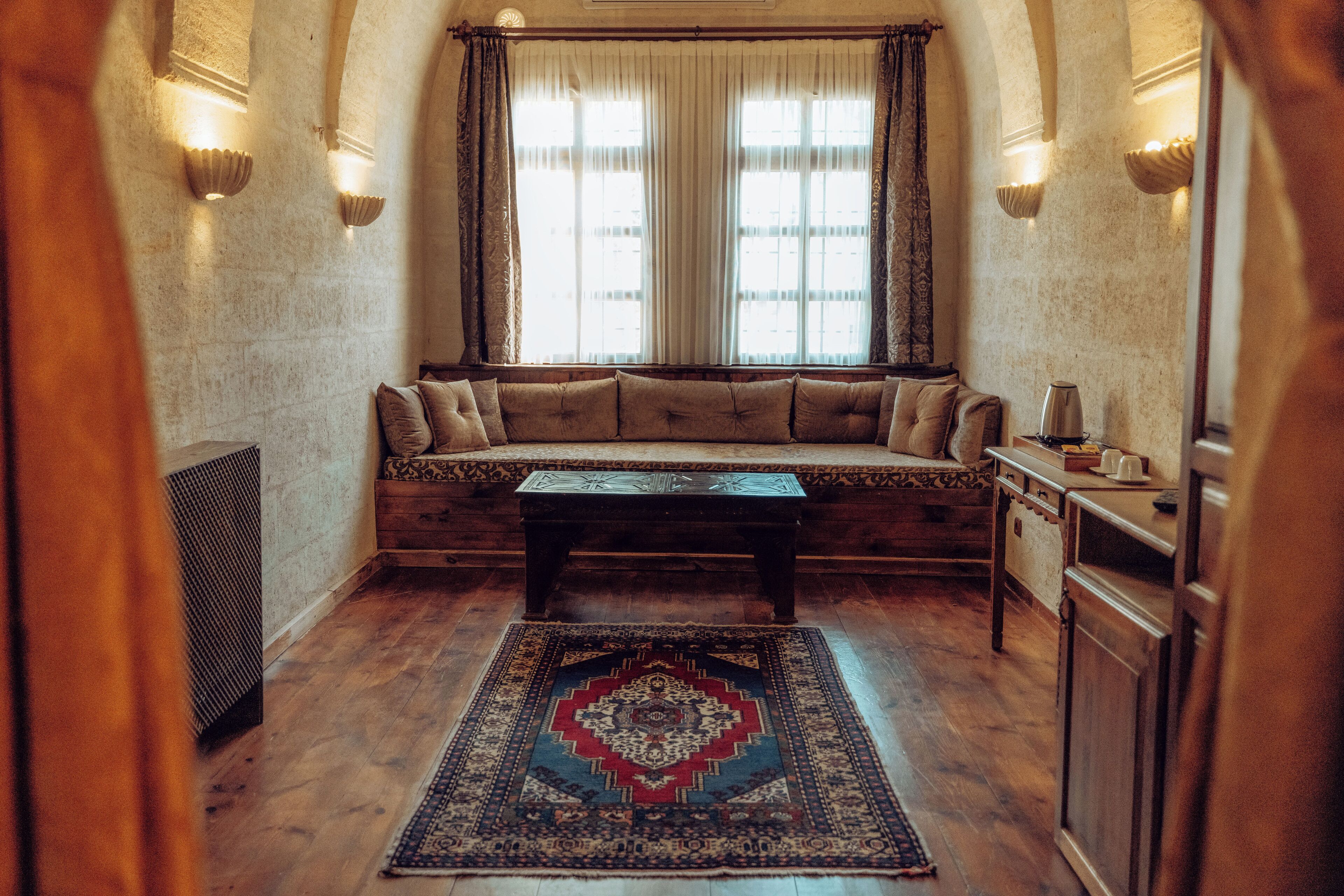 comfort suite | living area | 80-inch tv with satellite channels, ping pong, books