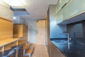 Family Studio, 1 Bedroom, Terrace, Ground Floor | Private kitchen | Full-size fridge, microwave, oven, stovetop