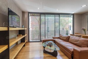 Design Penthouse, 2 Bedrooms, Terrace | Living area | Flat-screen TV - MSB Gracia Pool Terrace Center (Barcelona)