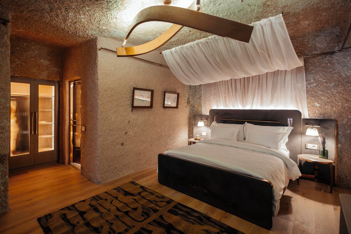 Homelike Cave | Premium bedding, minibar, in-room safe, blackout drapes