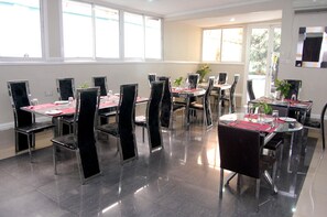 Breakfast, lunch served; local and international cuisine, garden views  - Primal Hotel Ikeja GRA (Lagos)