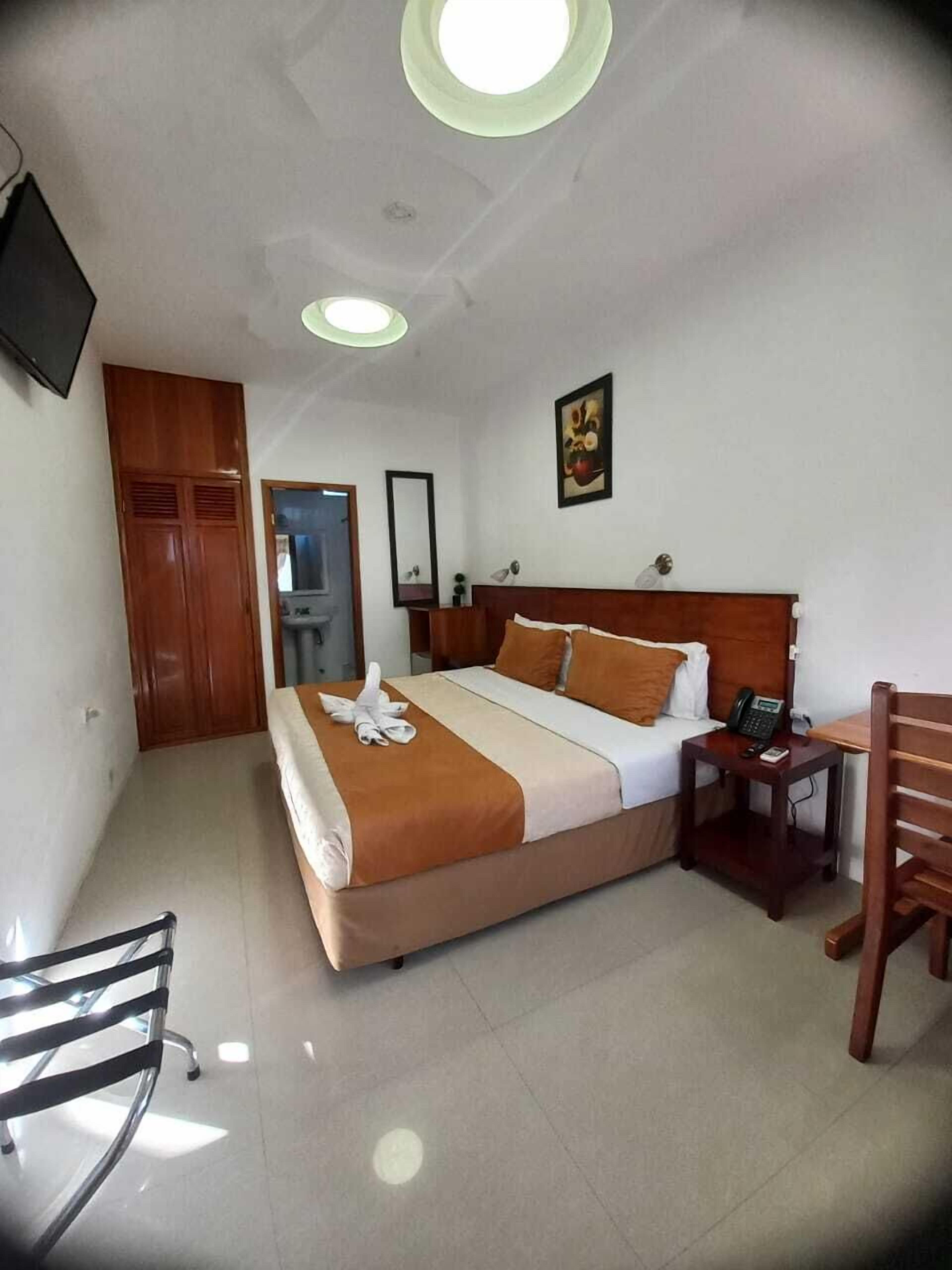 economy single room, ensuite | in-room safe, desk, iron/ironing board, free wifi