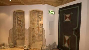 Unique architectural design with checkered tile walls and a geometric door.