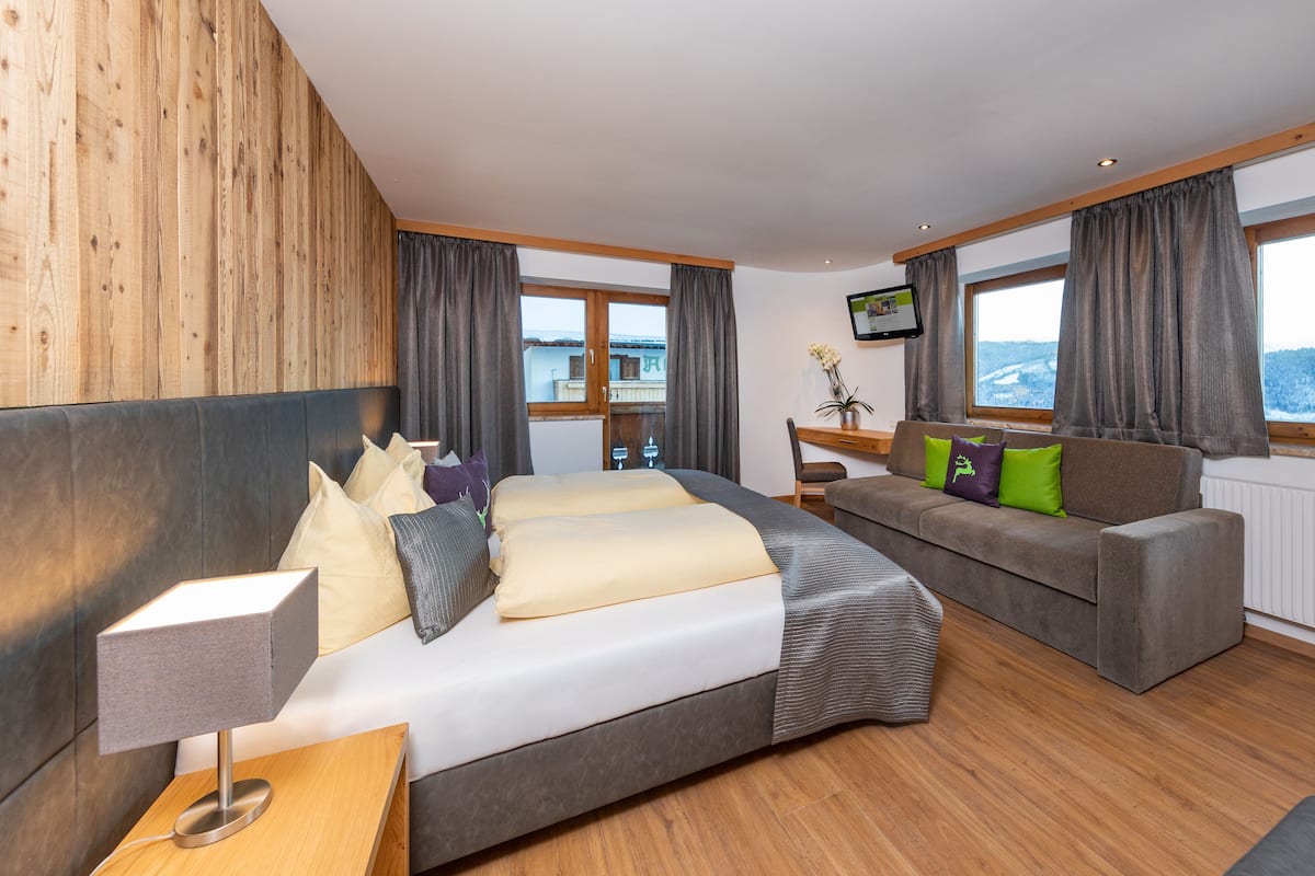 Premium bedding, laptop workspace, soundproofing
