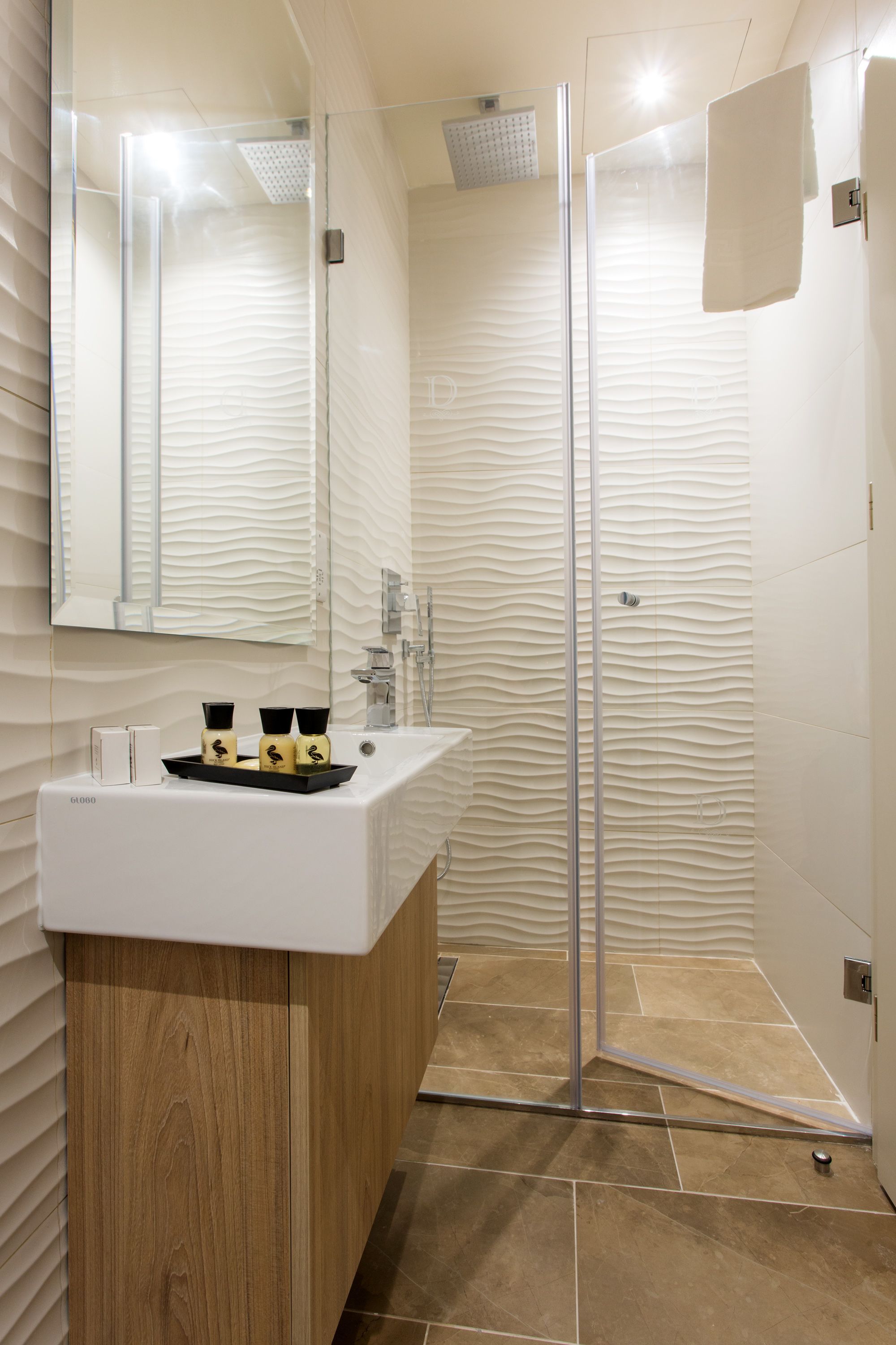 family room | bathroom | designer toiletries, hair dryer, bathrobes, slippers