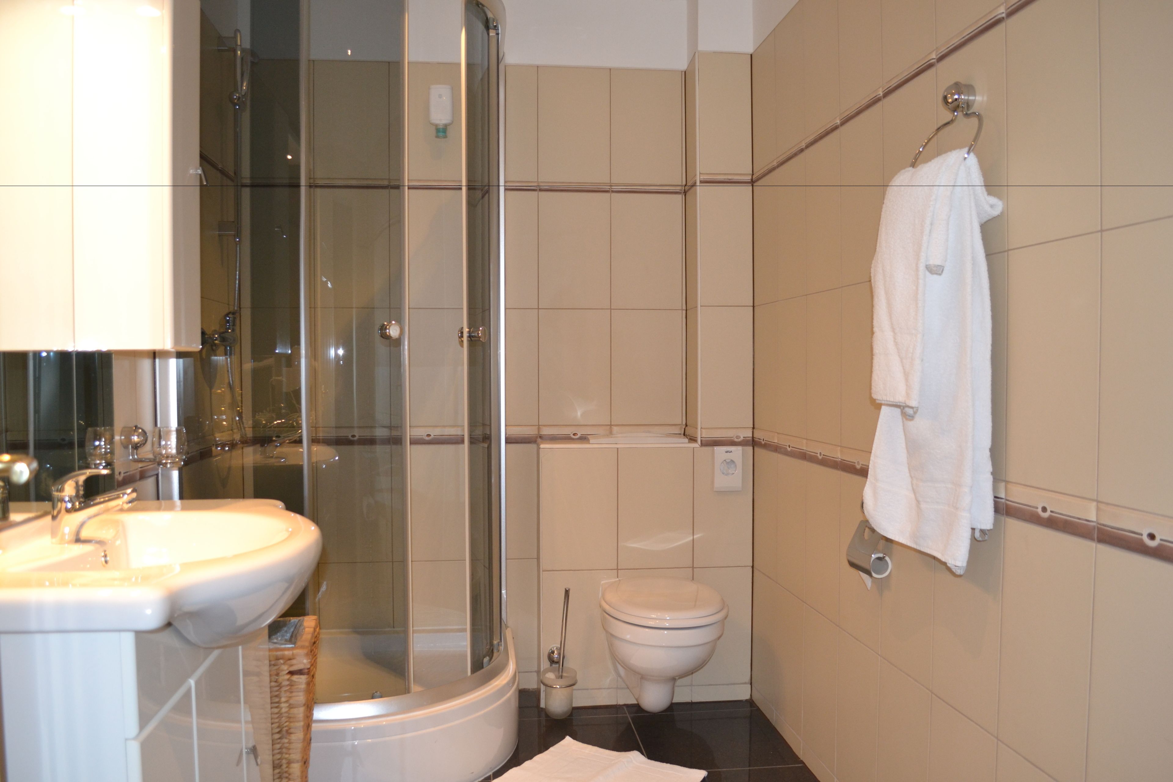 family room | 1 bedroom, minibar, in-room safe, desk