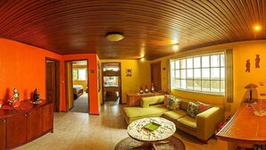 Family Apartment, 2 Bedrooms, Garden View | Living area | 32-inch LED TV with digital channels, TV