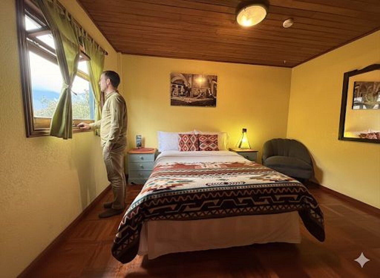 Habitación individual básica, 1 habitación, vista al jardín (Baño Compartido) | Ropa de cama de alta calidad, edredón y camas con pillow-top 