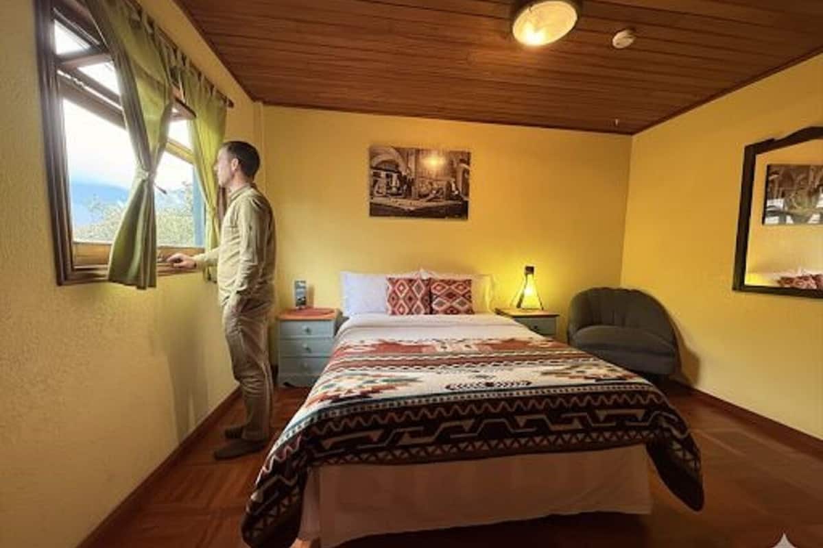 Habitación individual básica, 1 habitación, vista al jardín (Baño Compartido) | Ropa de cama de alta calidad, edredón y camas con pillow-top