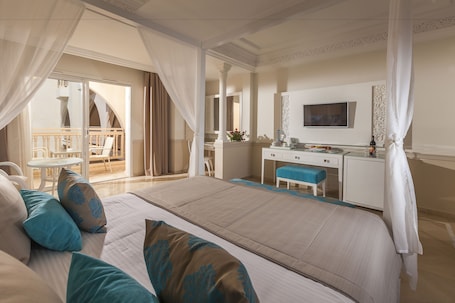 Minibar, in-room safe, desk, blackout drapes. TUI BLUE Palm Beach Palace Djerba - Adults Only