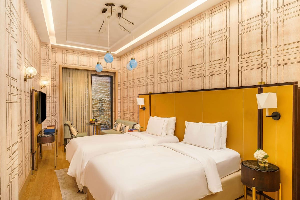 Premium bedding, in-room safe, individually decorated, desk