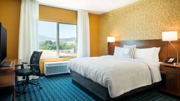 Hypo-allergenic bedding, desk, blackout drapes, iron/ironing board