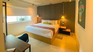 Suite, 1 cama King size, para no fumadores | Edredón, camas con pillow-top y caja de seguridad en la habitación