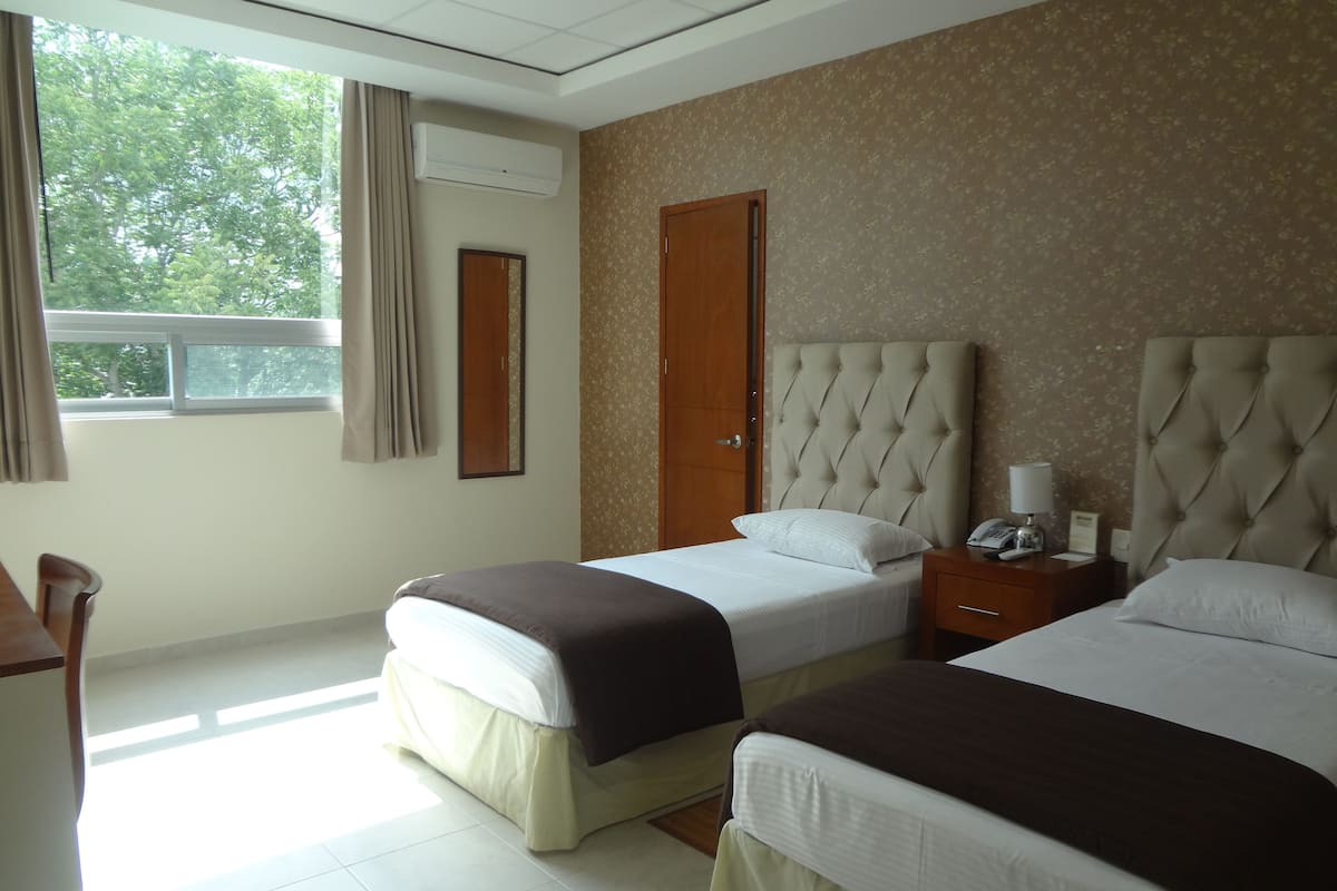 Junior Suite, 2 Twin Beds | In-room safe, desk, iron/ironing board, WiFi (free)
