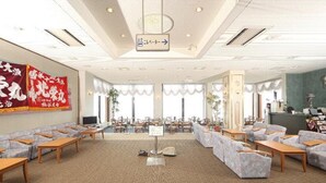A spacious hotel lobby with multiple seating areas, a reception desk, and large windows providing natural light. - Hotel Tappi (Sotogahama)