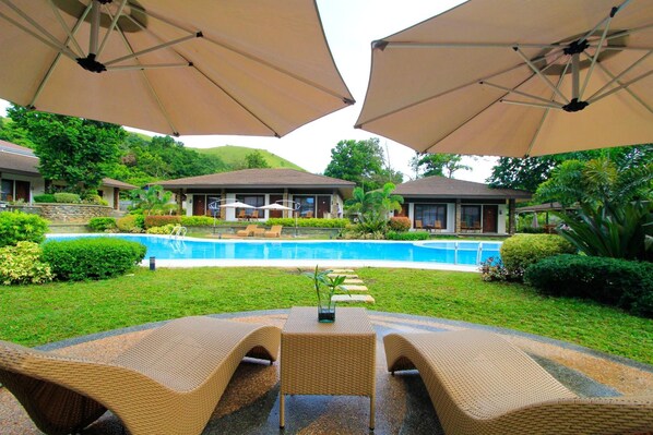 Outdoor pool, pool umbrellas, pool loungers