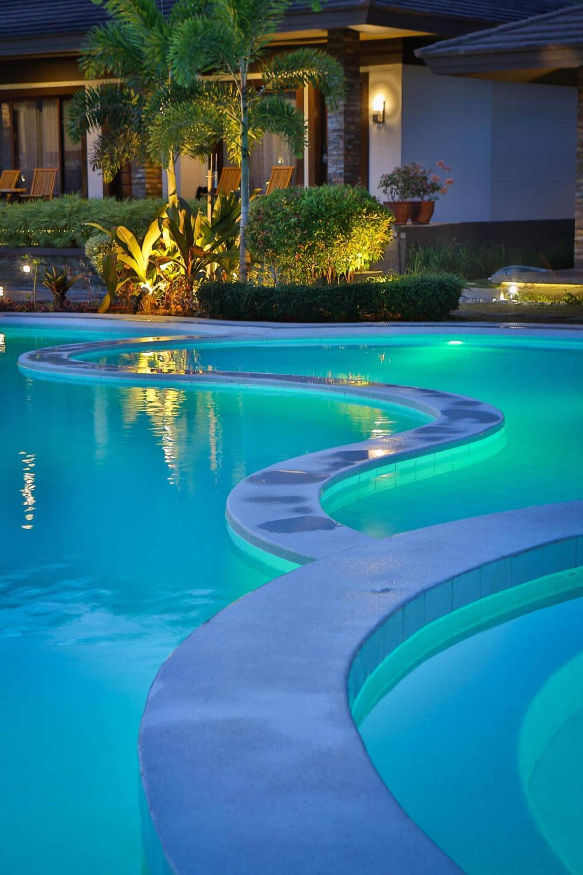 outdoor pool, pool umbrellas, pool loungers