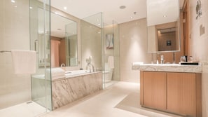 A modern bathroom with a glass-enclosed shower, a marble sink, and wooden cabinetry. - Yun Hotel Wuhan (Wuhan)