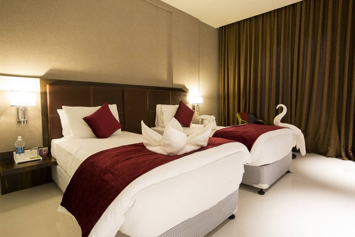 Quarto superior | Frigobar, cofres nos quartos, escrivaninha