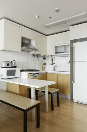 Luxury Apartment, 2 Bedrooms, Kitchen, City View | Private kitchen | Full-size fridge, microwave, stovetop, coffee/tea maker