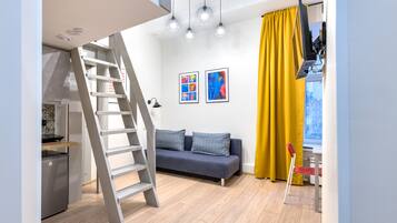 Estudio estándar, 1 cama matrimonial y sofá cama, cocineta (Yellow) | Tabla de planchar con plancha y wifi gratis