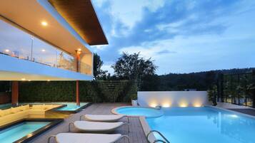 Outdoor pool, open 8 AM to 8 PM, pool loungers