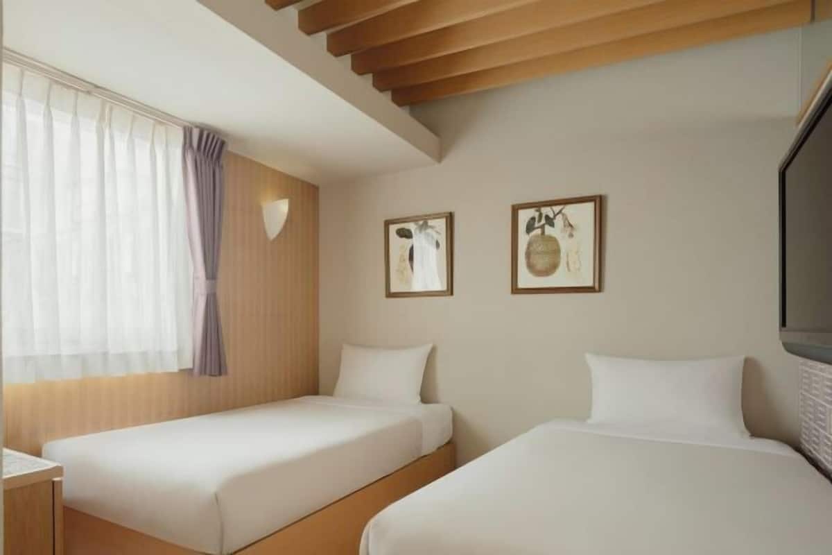 Chambres insonorisées, fer et planche à repasser, Wi-Fi gratuit