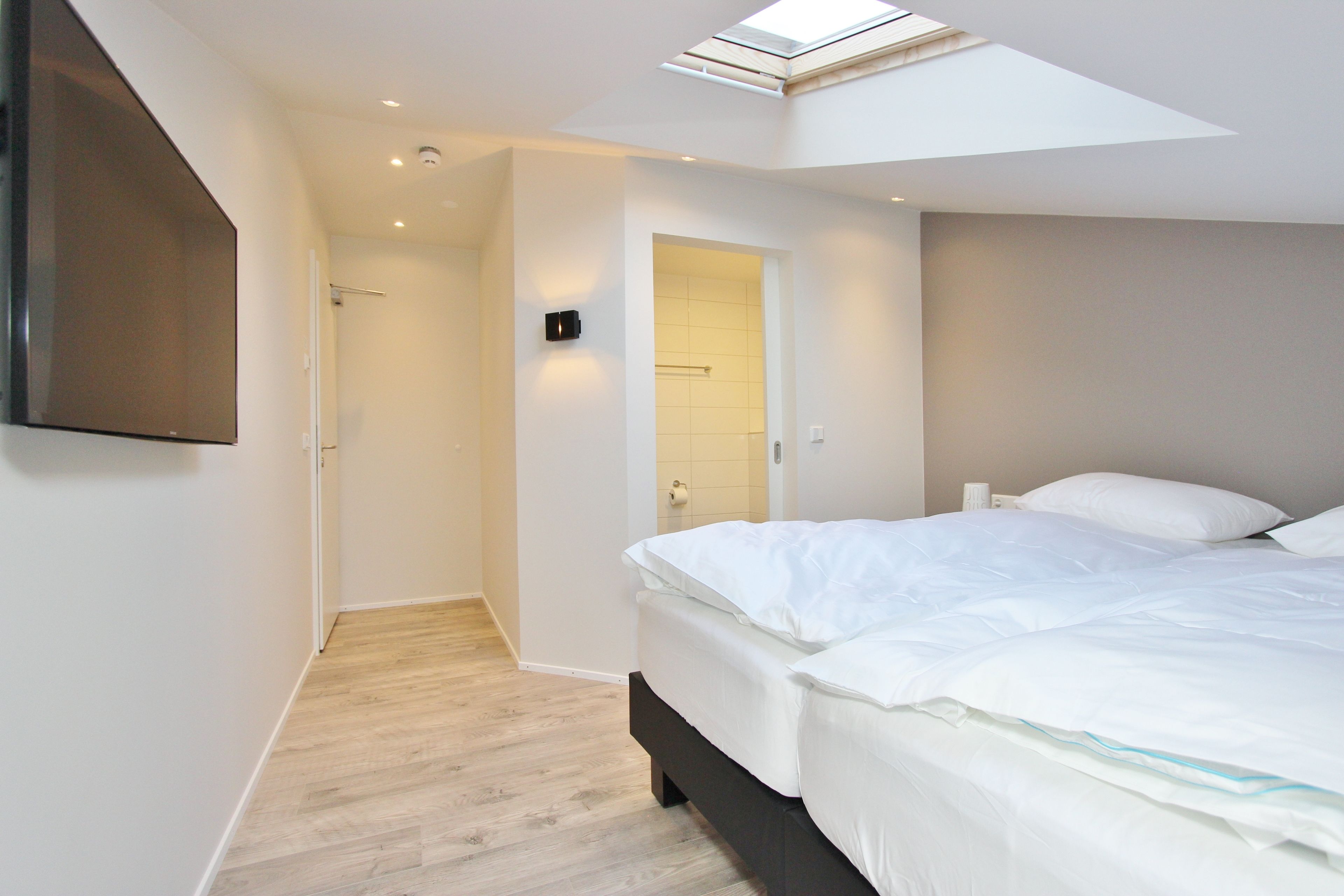 economy twin room | premium bedding, individually decorated, blackout curtains