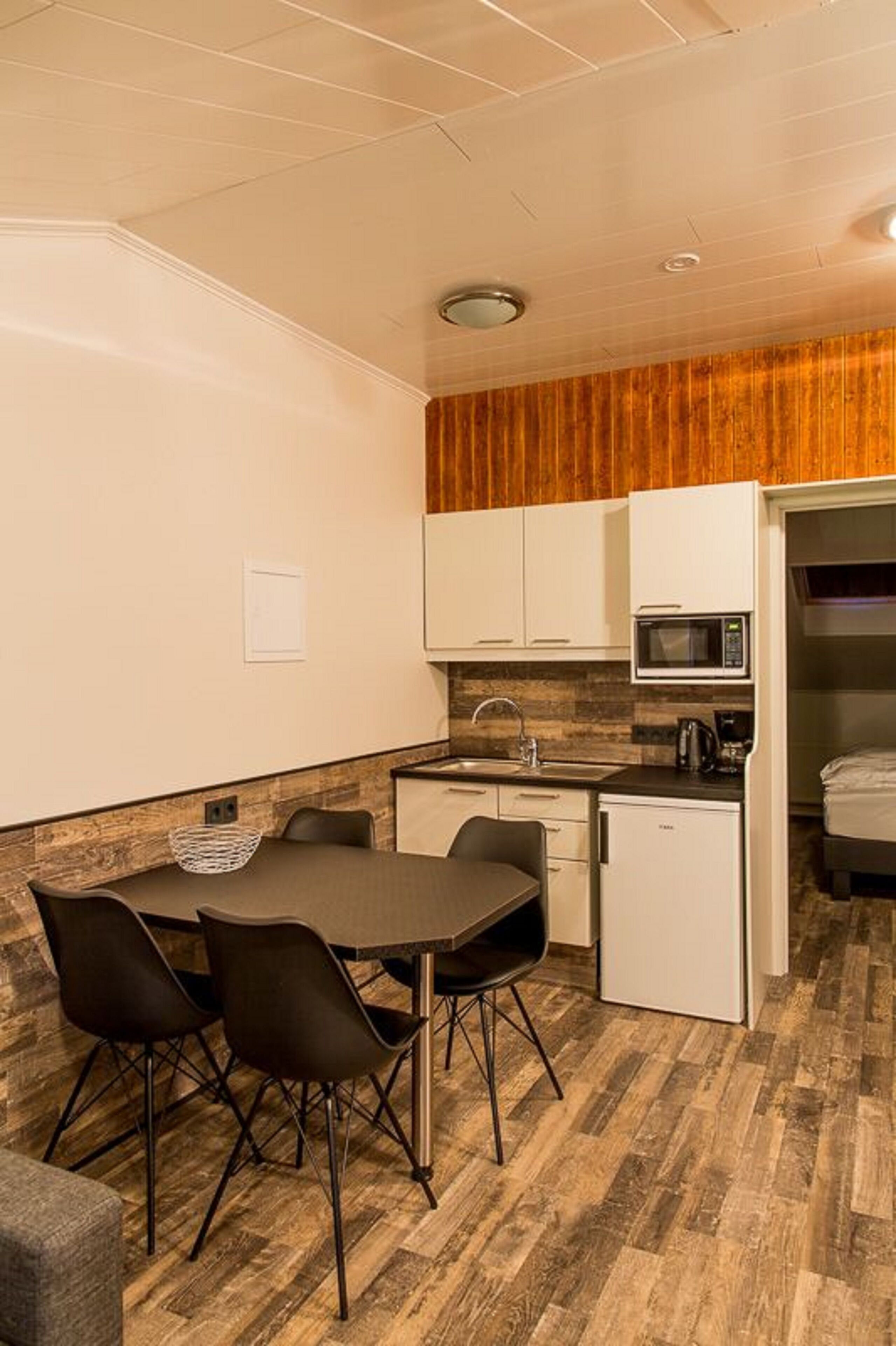 comfort studio | premium bedding, individually decorated, blackout curtains