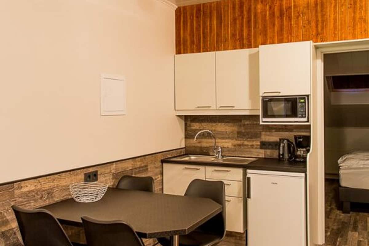 comfort studio | premium bedding, individually decorated, blackout curtains