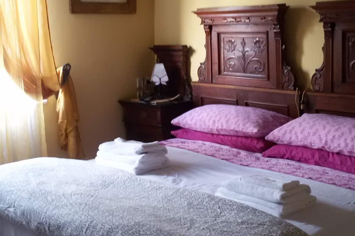 Deluxe kamer, 1 twee- of 2 eenpersoonsbedden | 2 slaapkamers, gratis wifi, beddengoed